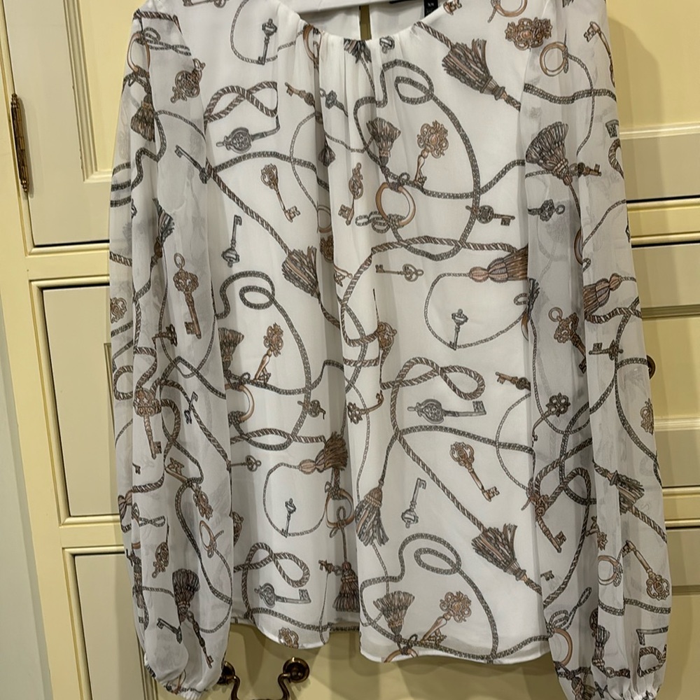 WHBM white long sleeve blouse with key/rope print-